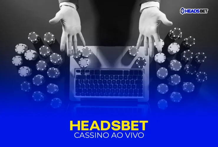 duas mãos masculinas abertas sobre um computador cinza com teclas pretas com várias fichas de cassino em volta e algumas em cima do computador. cassino ao vivo na headsbet